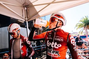 lotto intermarche rider with virtuoos recovery shake at training camp